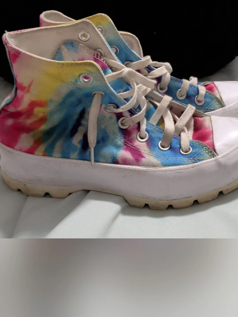 Converse Tie-Dye High-Top Sneakers.